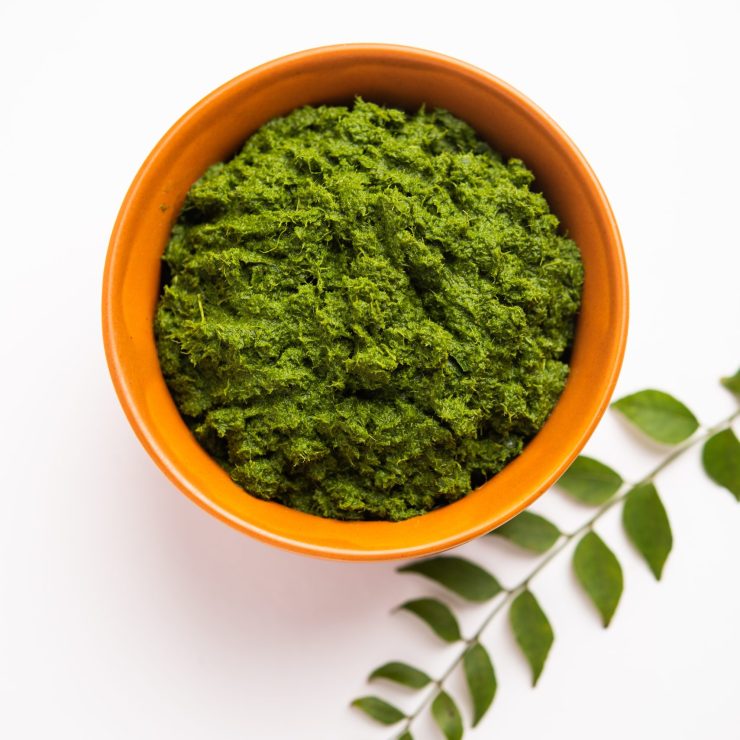 curry leaves or kadi patta chutney in a bowl